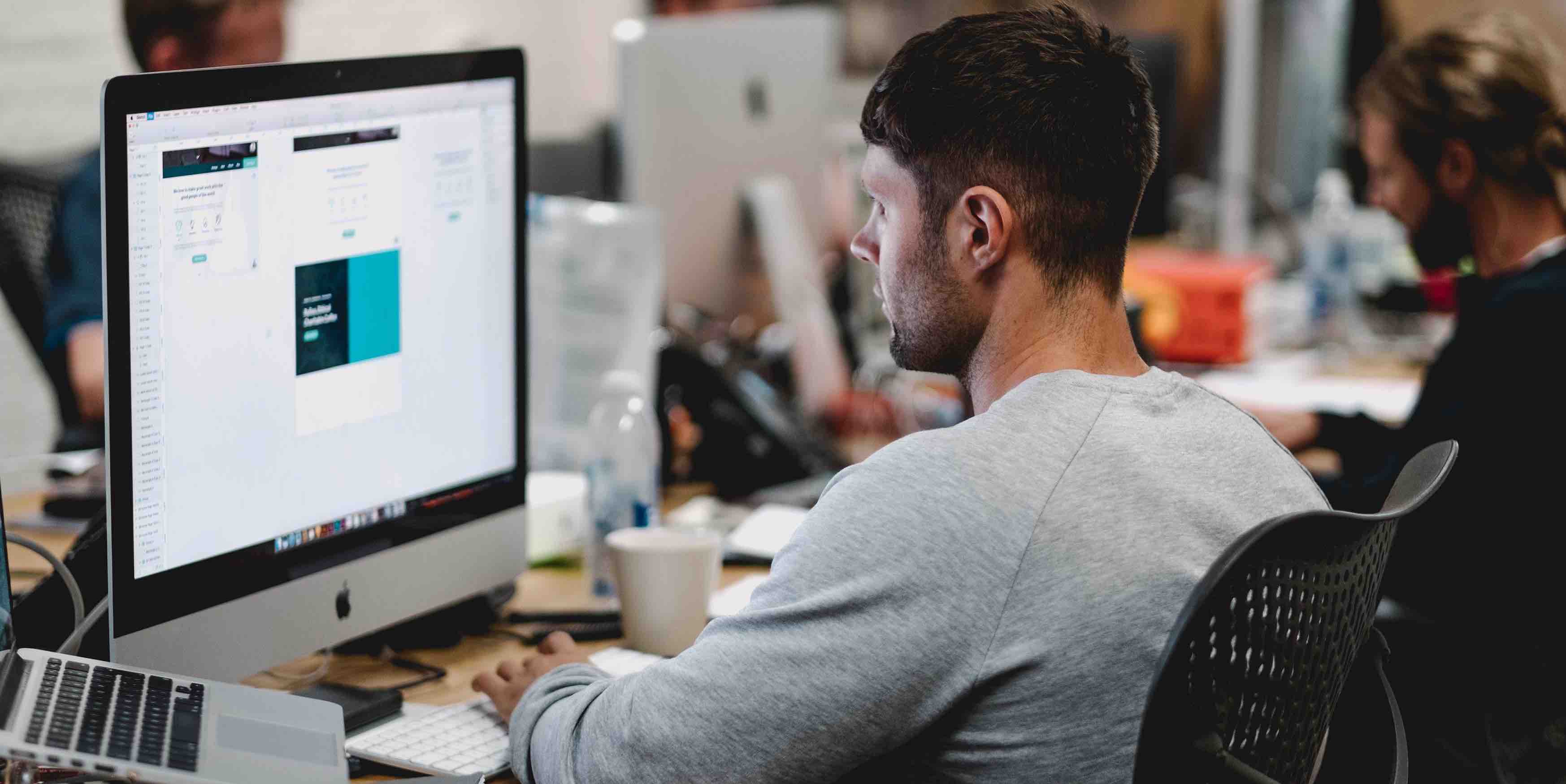 cyber security men on computers working